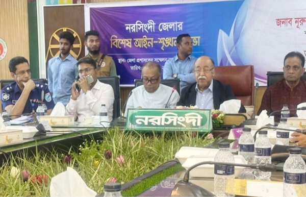 Industries Minister Nurul Majid Mahmud Humayun speaking at meeting