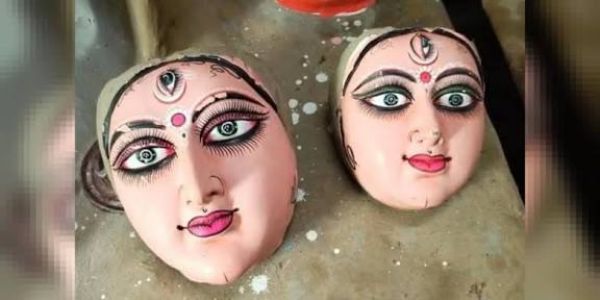 মূর্তির কাঠামো থেকে দুটি দুর্গাপ্রতিমার মুখ উপড়ে নেওয়া নিয়ে উত্তেজনা