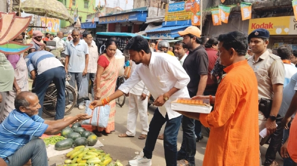 বিধায়ক এর মিষ্টি বিতরণ