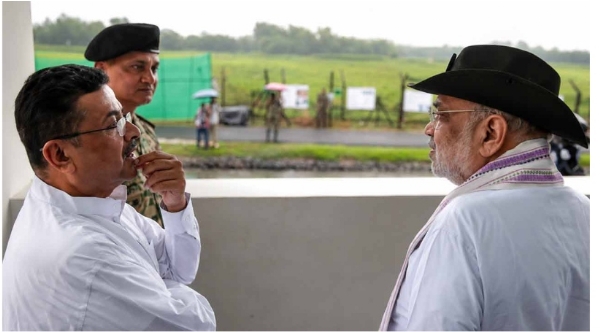 শুভেন্দু অধিকারী ও অমিত শাহ শুভেন্দু অধিকারী ও অমিত শাহ