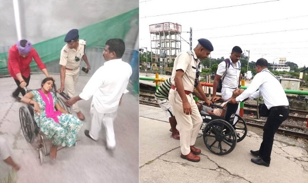 আরপিএফ-এর জওয়ানরা যাত্রীদের চিকিৎসা সহায়তা প্রদান করছেন আরপিএফ-এর জওয়ানরা যাত্রীদের চিকিৎসা সহায়তা প্রদান করছেন